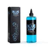 Stigma Tattoo Blue Soap 12oz (360ml) bottle with blue liquid, displayed alongside its black packaging box.